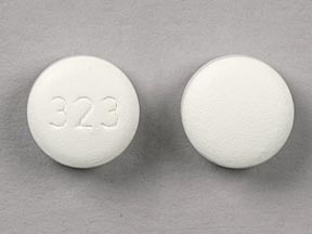 Pill 323 is Anacin Advanced Headache Formula acetaminophen 250 mg / aspirin 250 mg / caffeine 65 mg