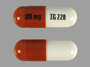 100 mg IG228 Pill - brown & white  capsule-shape