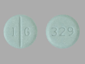 Pill I G 329 Green Round is Warfarin Sodium