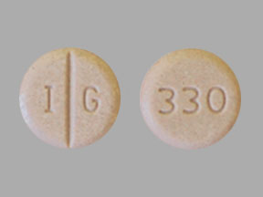 Pill I G 330 Tan Round is Warfarin Sodium