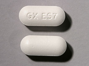 Pill GX ES7 White Capsule/Oblong is Ceftin