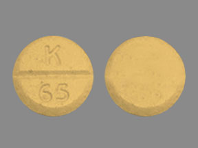 Pill K 65 Peach Round is Dextroamphetamine Sulfate