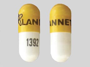 Pill Logo LANNETT 1392 Yellow & White Capsule/Oblong is Danazol