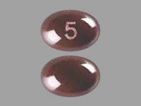 Pill 5 Brown Capsule/Oblong is Dronabinol