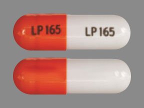 Pill LP 165 LP 165 Orange & White Capsule/Oblong is Clomipramine Hydrochloride