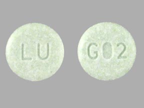 Pill LU G02 Green Round is Lovastatin