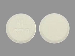 Pill NL 570 White Round is Methylphenidate Hydrochloride (Chewable)