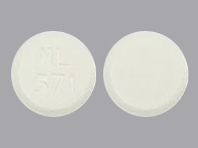 Pill NL 571 White Round is Methylphenidate Hydrochloride (Chewable)