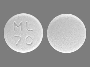 Pill ML 70 White Round is Famciclovir