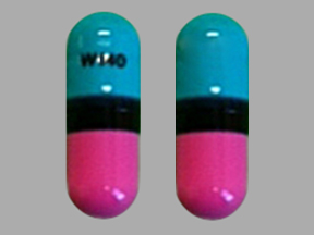 Pill W 140 Pink Capsule/Oblong is Lansoprazole Delayed Release