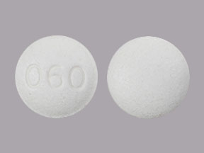 Pill 060 White Round is Clonidine Hydrochloride Extended Release