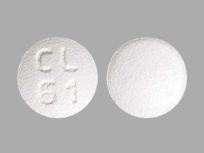 Pill CL61 White Round is Tolterodine Tartrate