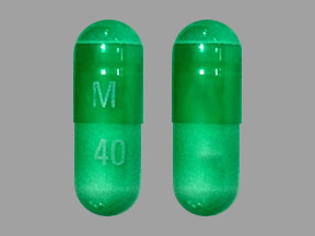 Pill M 40 Green Capsule/Oblong is Clindamycin Hydrochloride