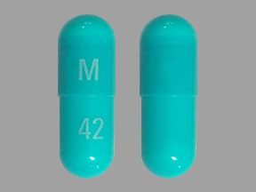 Pill M 42 Blue Capsule/Oblong is Clindamycin Hydrochloride