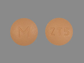 Pill M ZT5 Pink Round is Zolmitriptan