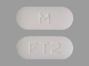 Pill M FT2 White Capsule/Oblong is Fenofibrate