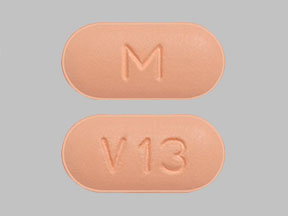 Pill M V13 Red Capsule/Oblong is Valsartan