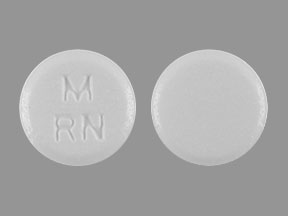 Pill M RN White Round is Risperidone (Orally Disintegrating)