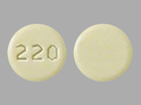 Pill 220 Yellow Round is Norethindrone