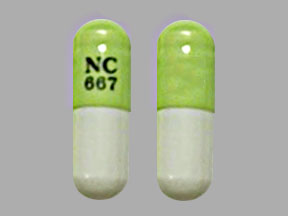 Pill NC 667 Green & White Capsule/Oblong is Calcium Acetate