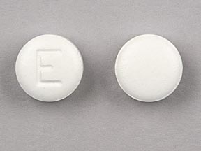 Pill E White Round is Excedrin Migraine (Tablet)