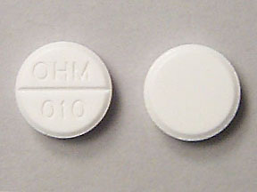 Pill OHM 010 White Round is Acetaminophen