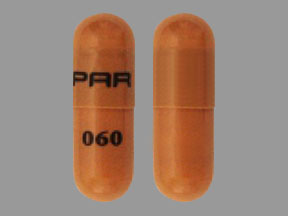 Pill PAR 060 Brown Capsule/Oblong is Trientine Hydrochloride