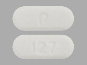 Pill P 127 White Capsule/Oblong is Everolimus
