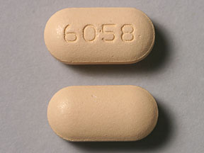 Pill 6058 Orange Oval is Glyburide and Metformin Hydrochloride