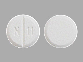 Pill N 11 White Round is Benztropine Mesylate
