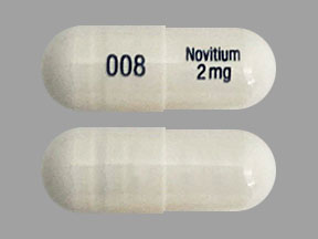 Pill 008 Novitium 2 mg White Capsule/Oblong is Nitisinone