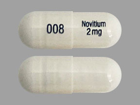 Pill 008 Novitium 2 mg White Capsule/Oblong is Nitisinone