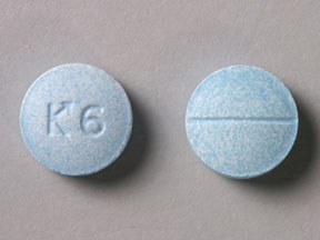 Pill K6 Blue Round is DiphenhydrAMINE Hydrochloride