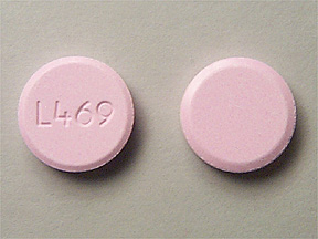 Pill L469 Pink Round is Bismuth Subsalicylate (Chewable)