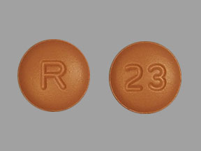 Pill R 23 Red Round is Donepezil Hydrochloride