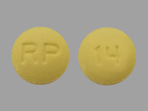 Pill RP 14 Yellow Round is Dexmethylphenidate Hydrochloride