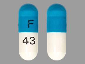 Pill F 43 Blue & White Capsule/Oblong is Atomoxetine Hydrochloride