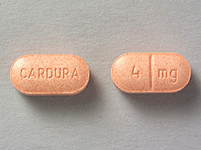 Pill CARDURA 4 mg Orange Oval is Doxazosin Mesylate