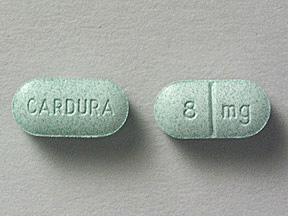 Pill CARDURA 8 mg Green Oval is Doxazosin Mesylate