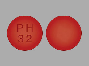 Pill PH 32 Orange Round is Docusate Sodium and Senna