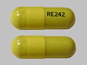 Pill RE242 Yellow Capsule/Oblong is RE DualVit Plus