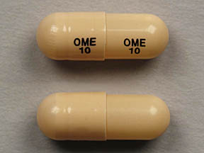 Pill OME 10 OME 10 Brown Capsule/Oblong is Omeprazole Delayed Release
