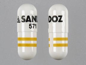 Pill S SANDOZ 571 White Capsule-shape is Amlodipine Besylate and Benazepril Hydrochloride