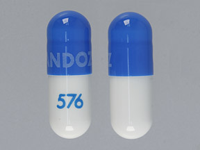 Pill SANDOZ 576 is Calcium Acetate 667 mg