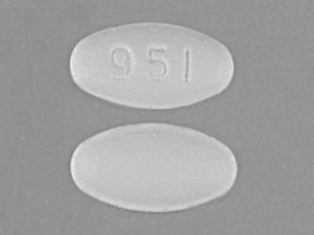 Pill 951 White Elliptical/Oval is Losartan Potassium