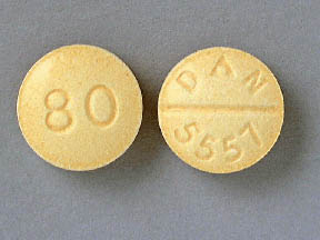 Pill 80 DAN 5557 Yellow Round is Propranolol Hydrochloride