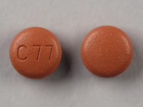 Pill C77 Red Round is Amlodipine Besylate and Olmesartan Medoxomil