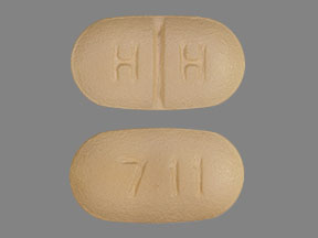 Pill H H 711 Beige Capsule/Oblong is Paroxetine Hydrochloride