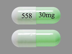Pill 558 30mg Green & White Capsule/Oblong is Duloxetine Hydrochloride Delayed-Release