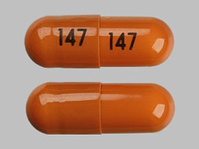 Pill 147 147 Orange Capsule/Oblong is Rivastigmine Tartrate